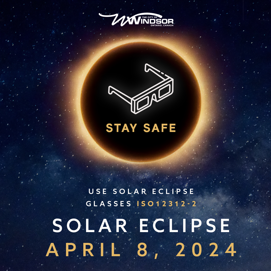 Glasses over an eclipse and words, Stay Safe, Use solar eclipse glasses ISO 12312-2