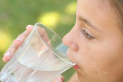 Drinking water to stay hydrated