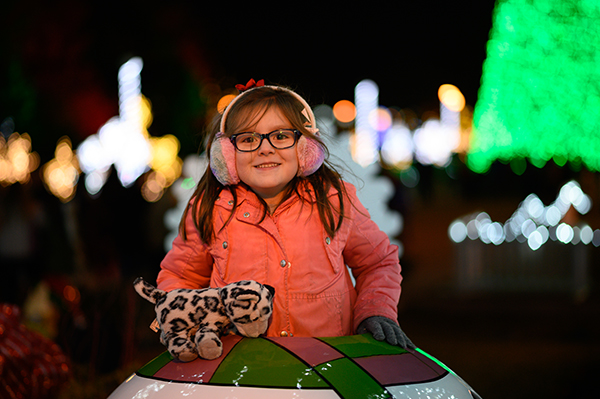 Little girl inside a novelty bulb