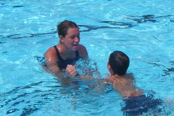 Swim instructor and youth student