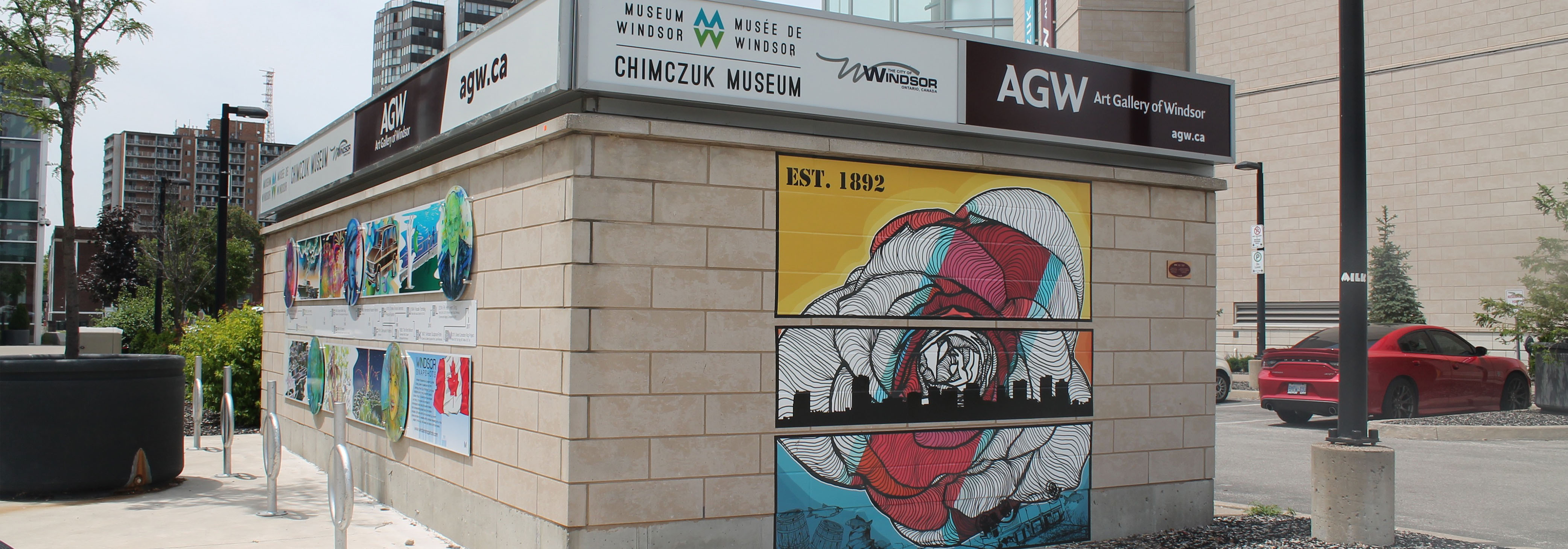 Mural showing Windsor's skyline, a rose and bright colours, and date stamp of established 1892, as detailed below